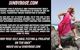 Sindy Rose self anal fisting & prolapse on an obstacle rock